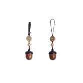 Colour-layered acorn mini urn keychains in a paired set, with patterned bead and braided loop — portable ashes keepsake