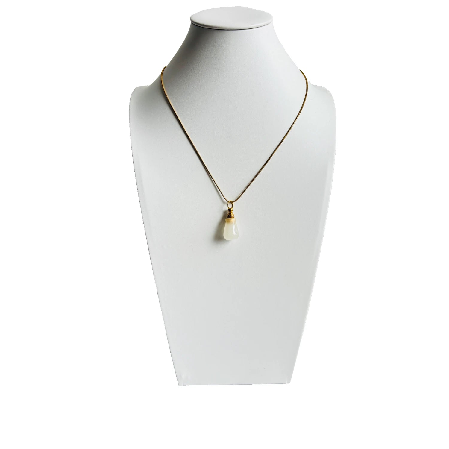 Natural agate cremation necklace on display bust, minimal gold chain