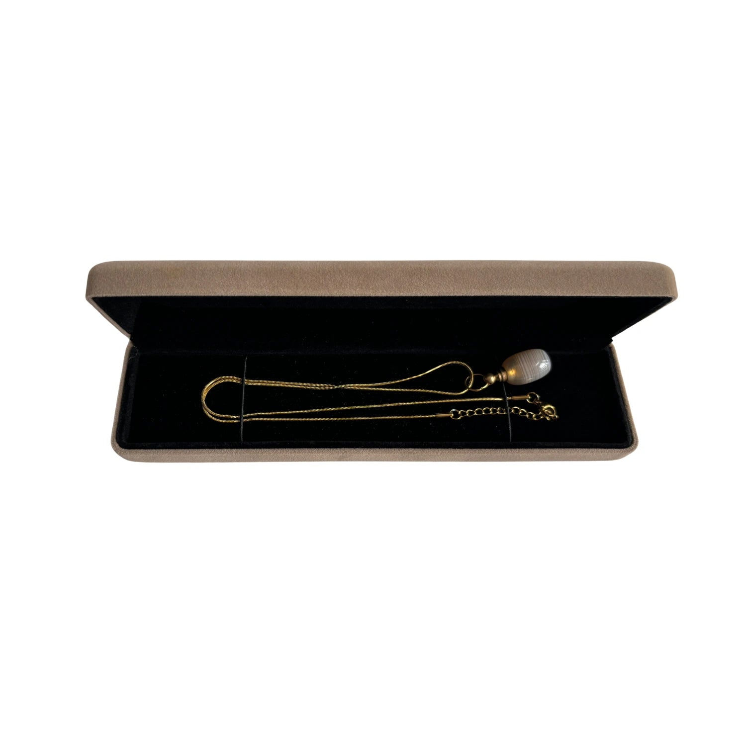 Gold agate cremation necklace neatly placed inside a velvet jewelry box, ready for gift or memorial presentation.