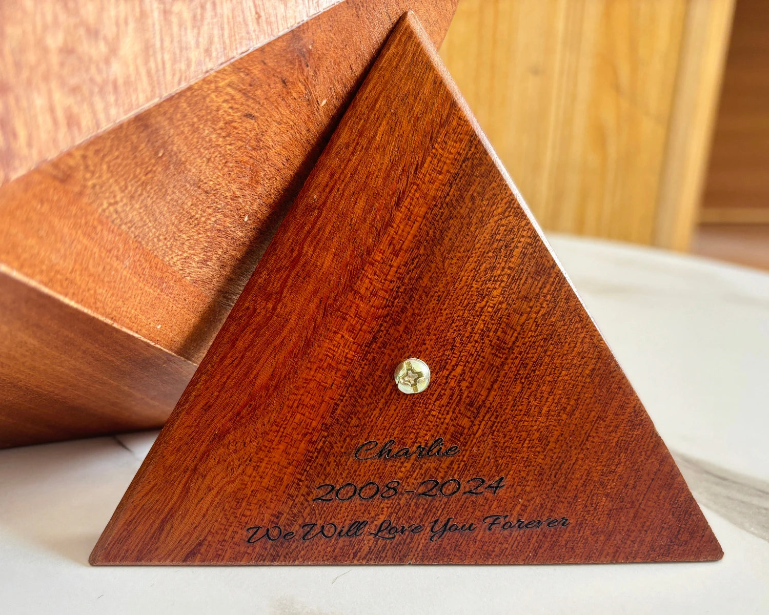Sapele icosahedron pet urn custom engraving content display