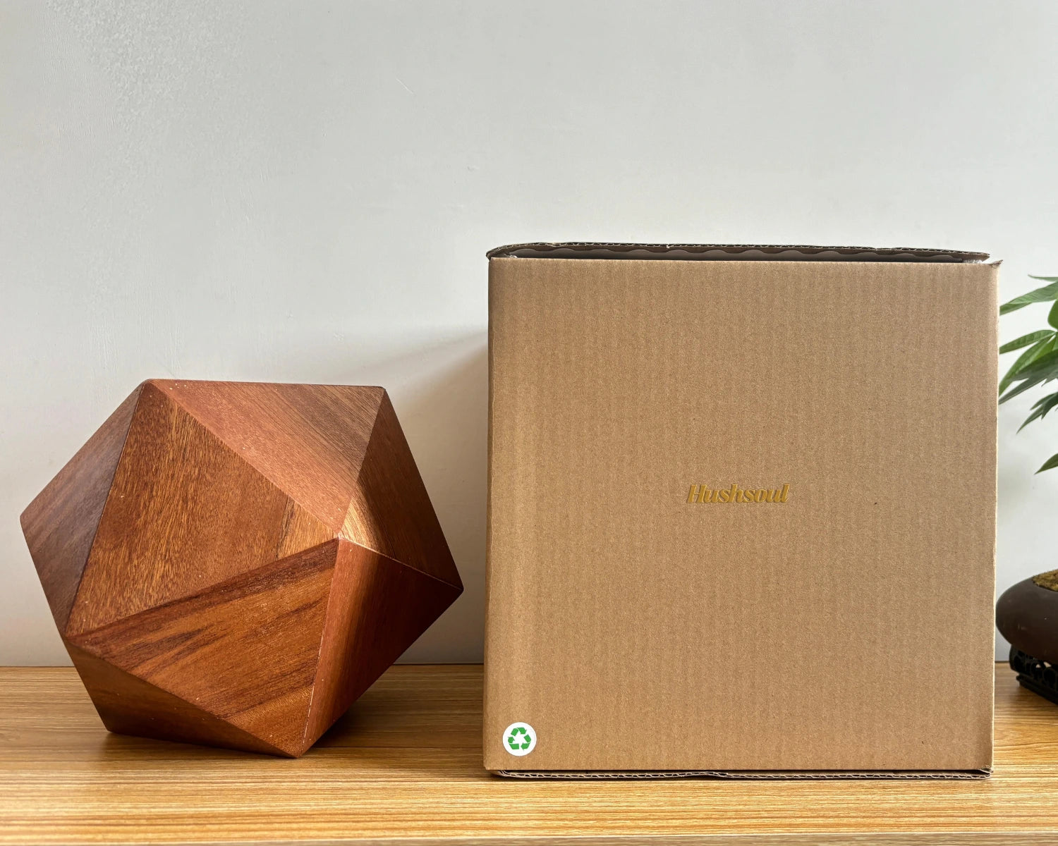 Sapele icosahedral pet urn physical display and recyclable packaging display
