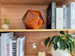 Solace Pet Urn — walnut wooden pet urn for ashes placed on a cabinet with decor