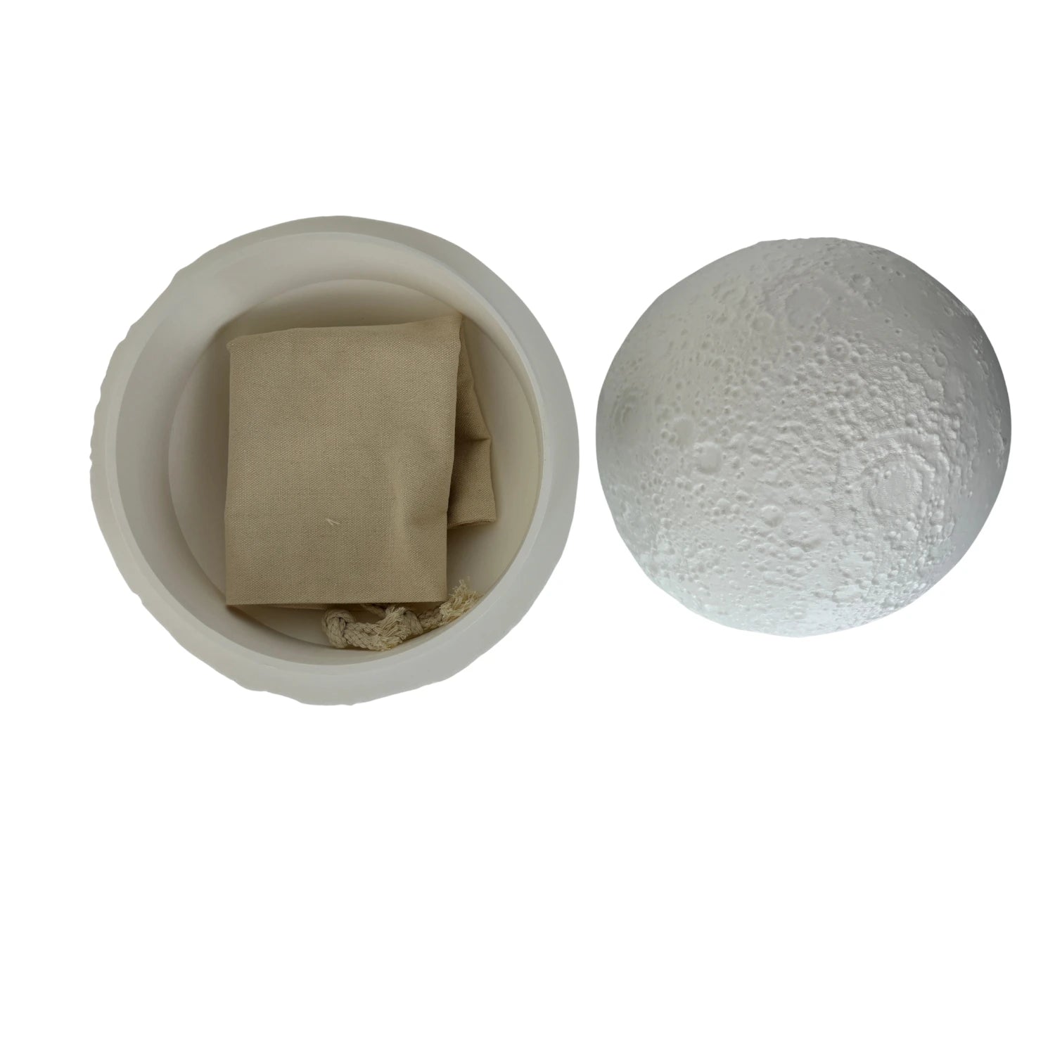 Bio Urn — open moon urn showing interior cavity and ash pouch